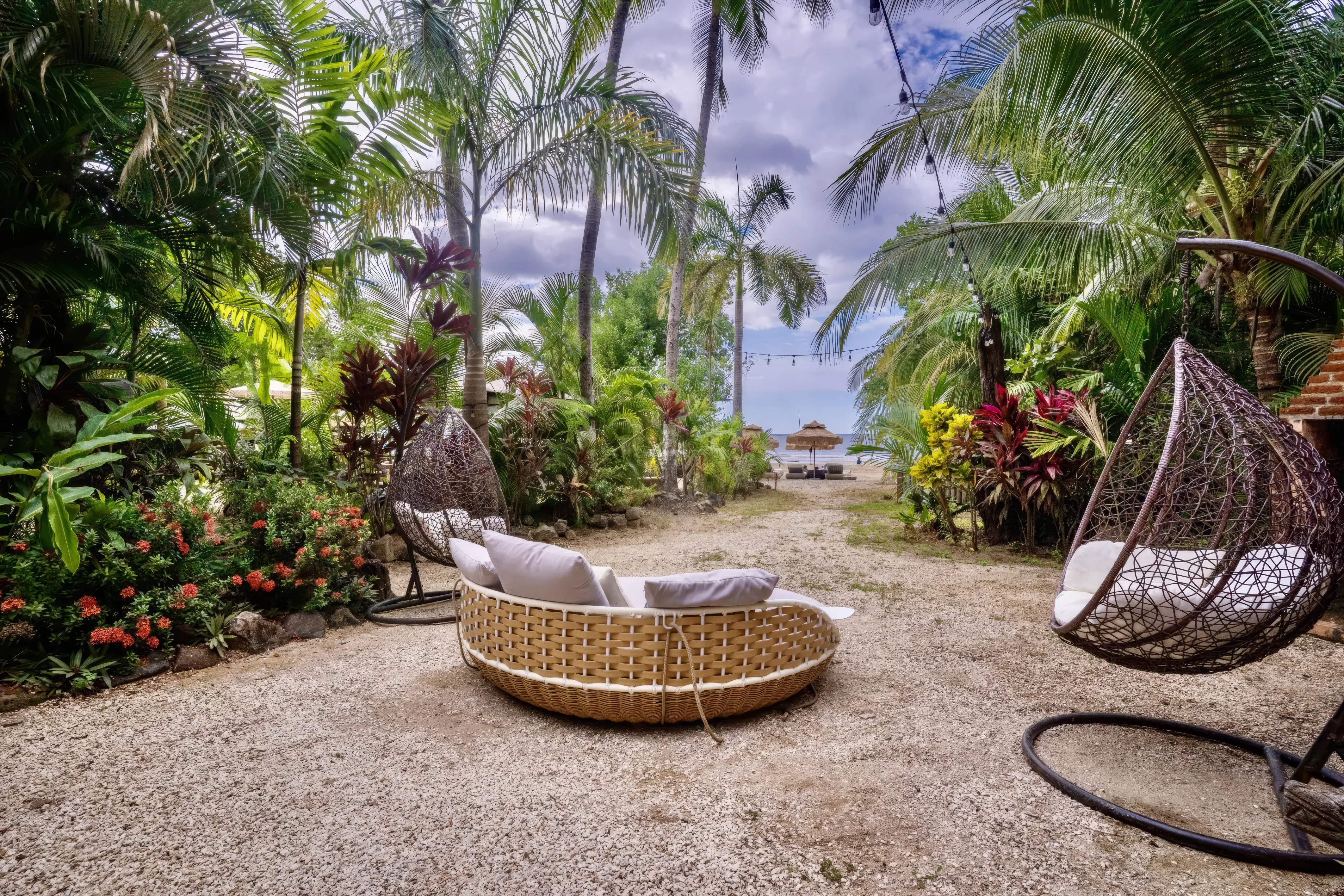 Casa Amor del Mar is a magnificent three-bedroom "Grand Villa" located within an exclusive adults-only beachfront complex, where the mangroves of the tropical dry forest